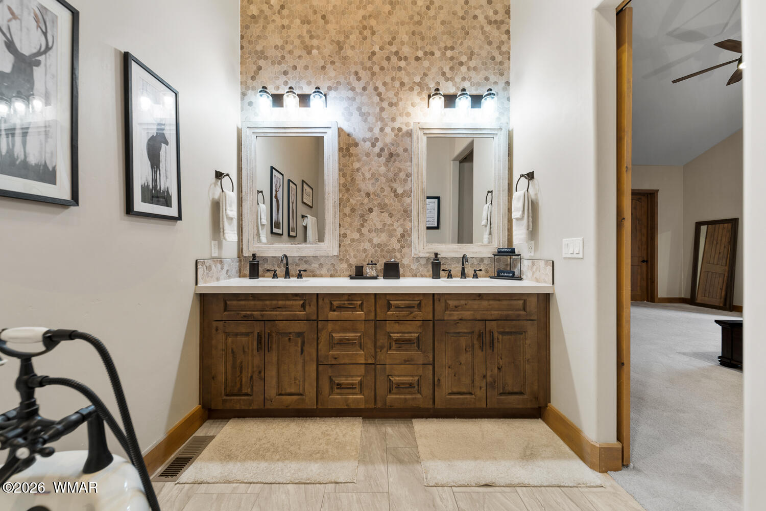 3360 West Blazingstar Road Show Low, AZ 85901 - Photo 47 of 71 a bathroom with a granite countertop sink a mirror and a vanity