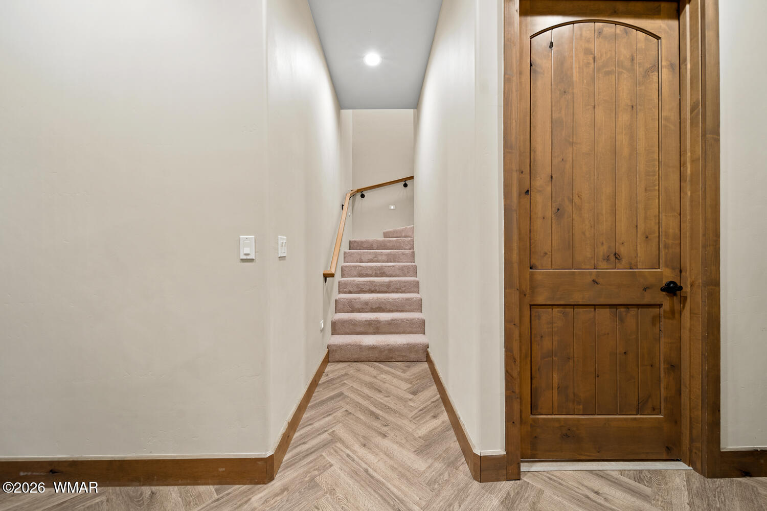 3360 West Blazingstar Road Show Low, AZ 85901 - Photo 49 of 71 a view of a hallway with wooden floor and staircase