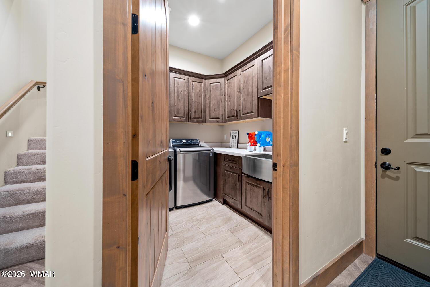 3360 West Blazingstar Road Show Low, AZ 85901 - Photo 54 of 71 a kitchen with stainless steel appliances a refrigerator and a window