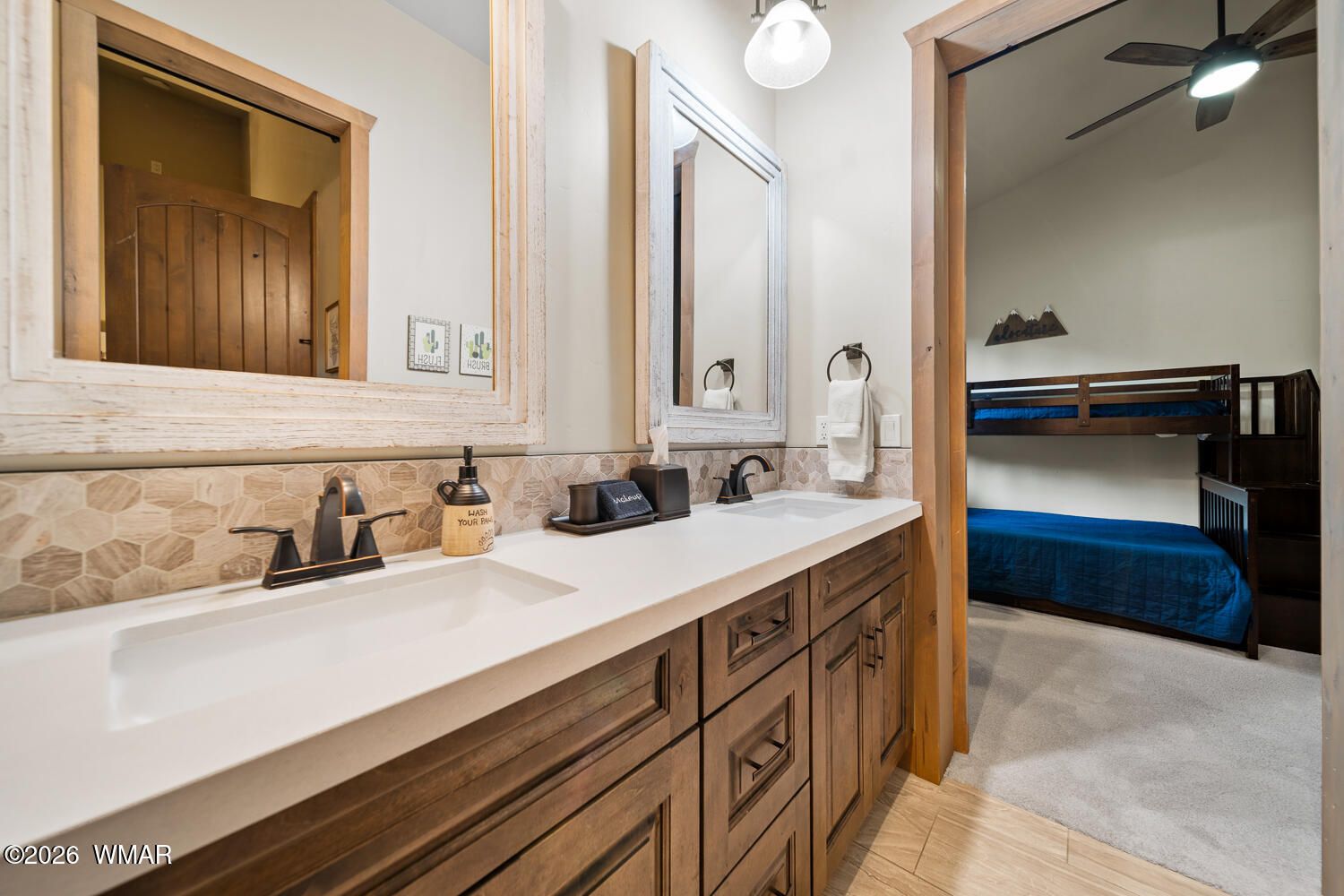 3360 West Blazingstar Road Show Low, AZ 85901 - Photo 61 of 71 a bathroom with a sink and a mirror