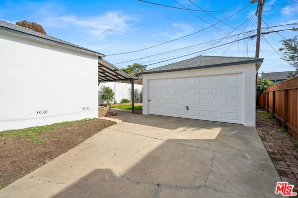 a front view of a house with a garage