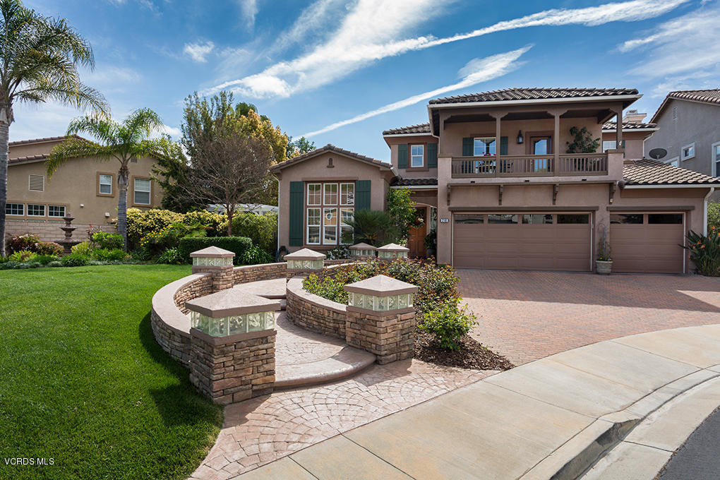 210 Knoll Ridge Road Simi Valley, CA 93065 - Photo 2 of 46 a front view of a house with garden