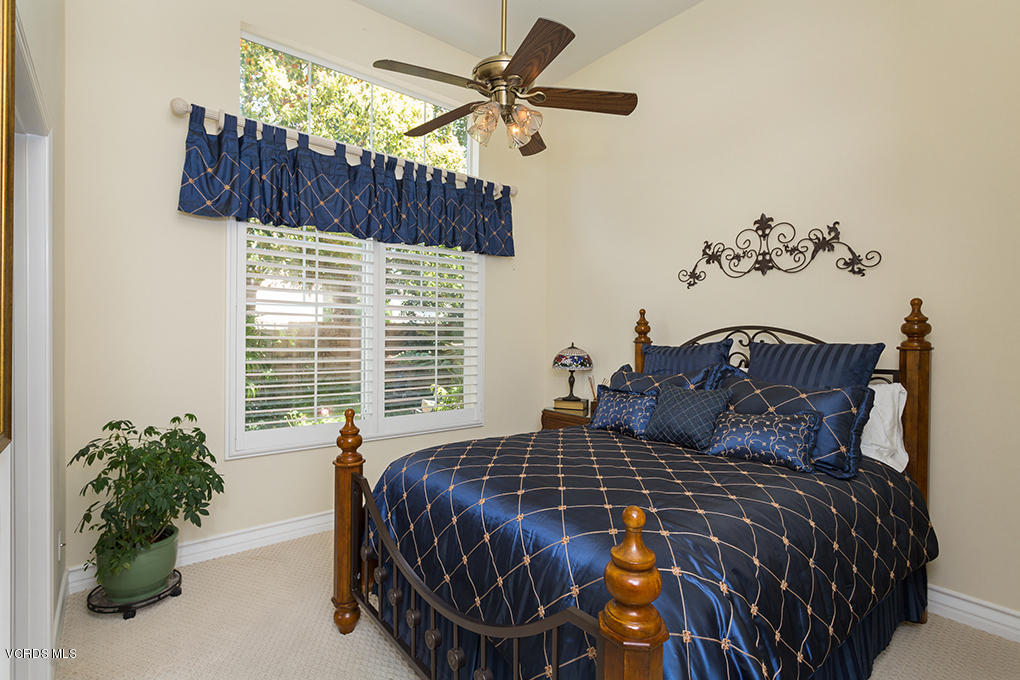 210 Knoll Ridge Road Simi Valley, CA 93065 - Photo 11 of 46 a bedroom with a bed and a window