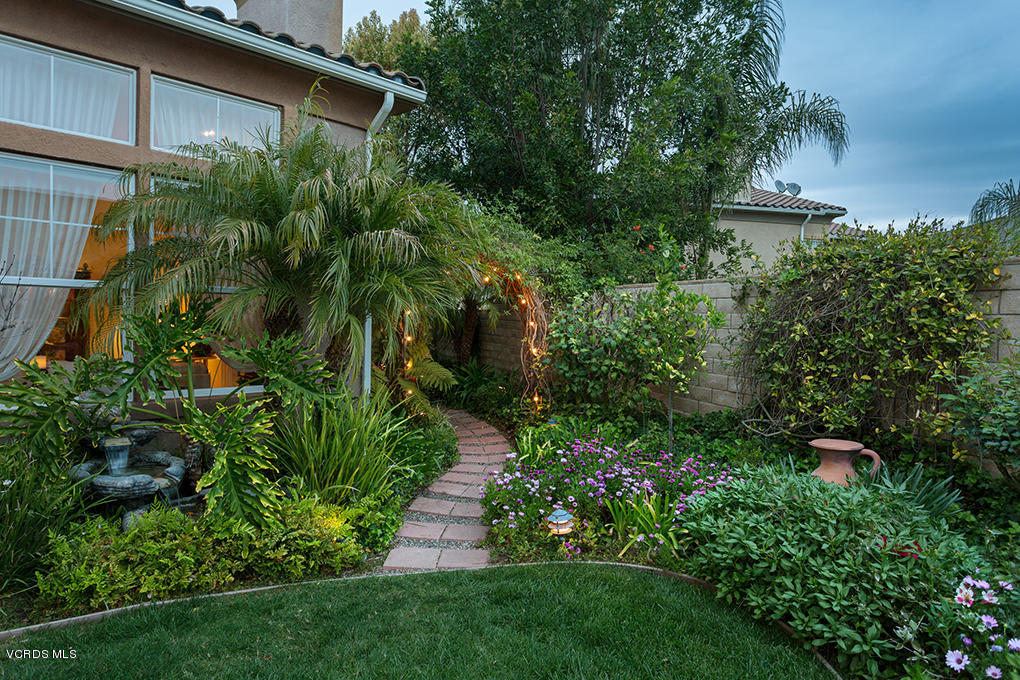 210 Knoll Ridge Road Simi Valley, CA 93065 - Photo 26 of 46 a view of a yard with plants and large trees