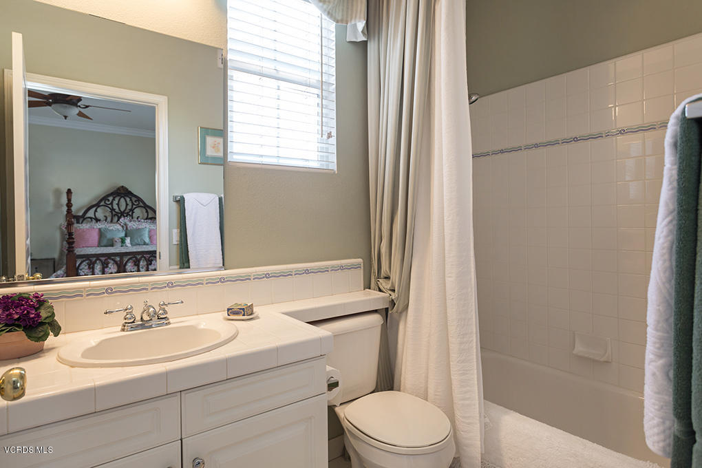 210 Knoll Ridge Road Simi Valley, CA 93065 - Photo 35 of 46 a bathroom with a sink a toilet and shower