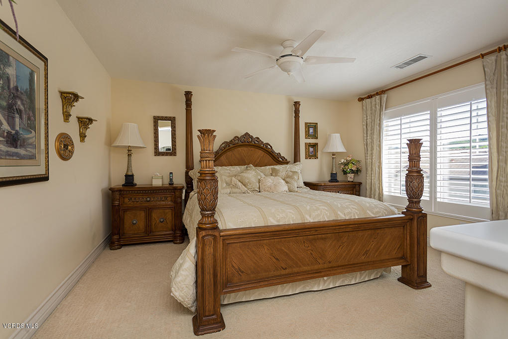 210 Knoll Ridge Road Simi Valley, CA 93065 - Photo 39 of 46 a bed sitting in a spacious bedroom next to a window