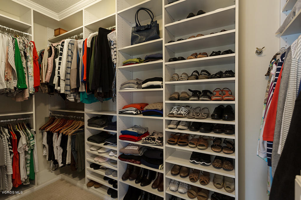 210 Knoll Ridge Road Simi Valley, CA 93065 - Photo 42 of 46 a view of walk in closet with clothes and shoes