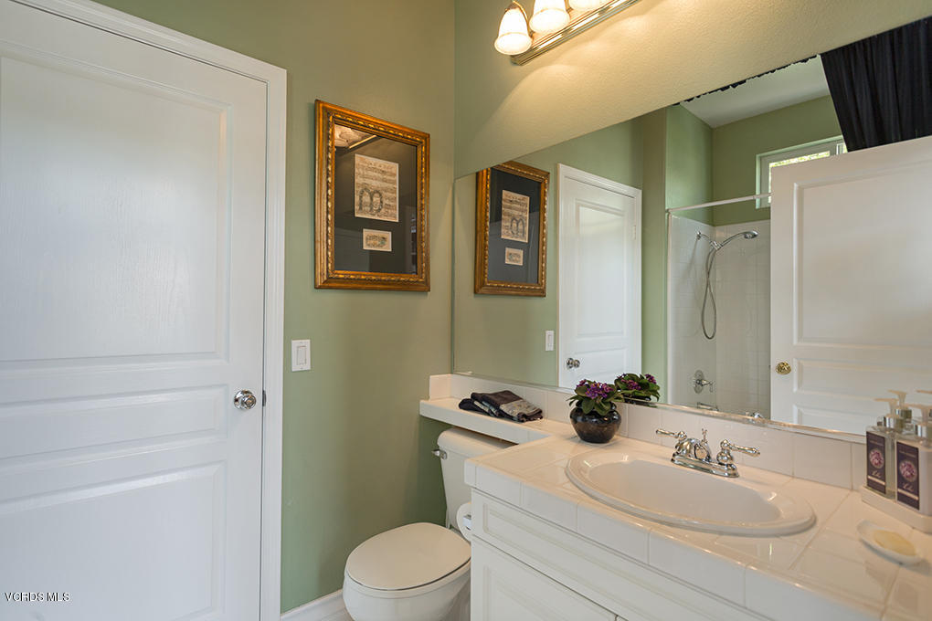 210 Knoll Ridge Road Simi Valley, CA 93065 - Photo 10 of 46 a bathroom with a sink a toilet and shower