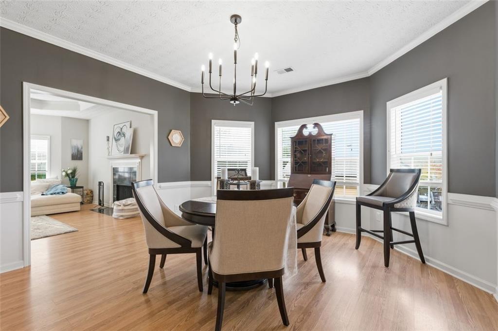 1856 Whitley Road Bethlehem, GA 30620 - Photo 2 of 28 a view of a dining room with furniture window and wooden floor