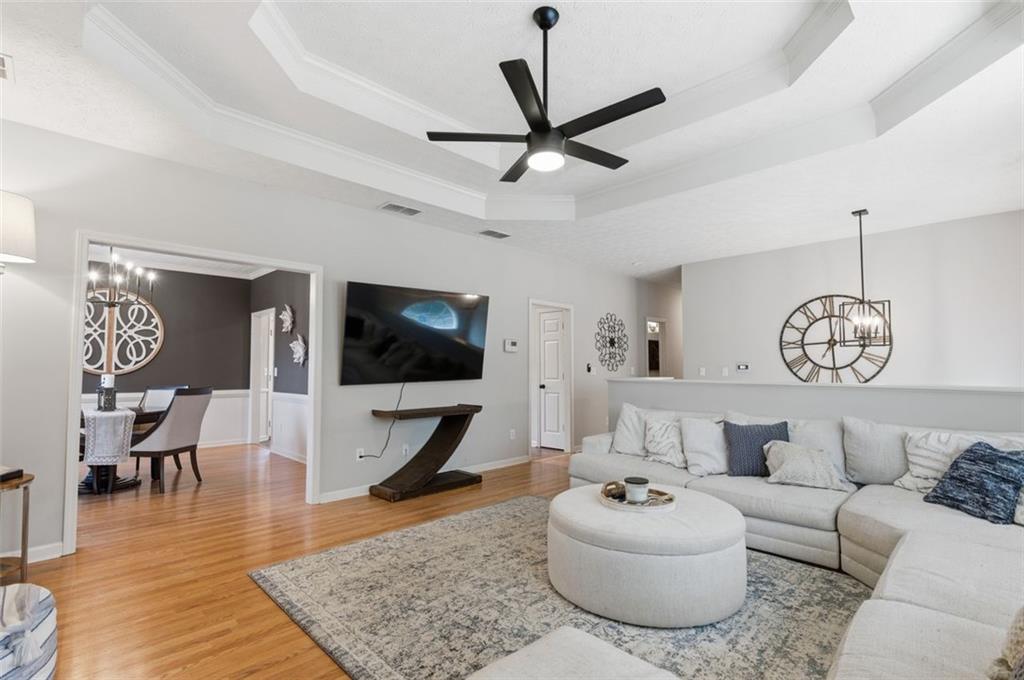 1856 Whitley Road Bethlehem, GA 30620 - Photo 8 of 28 a living room with furniture and a flat screen tv