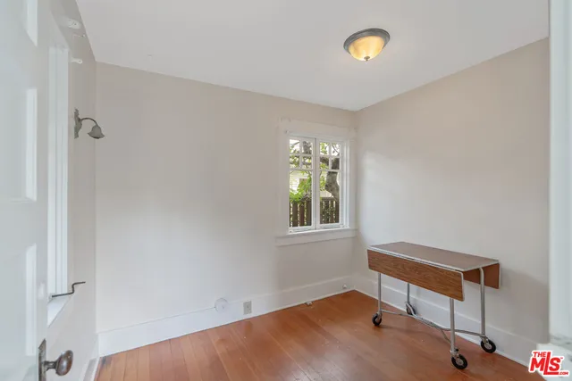 a room with window and a table