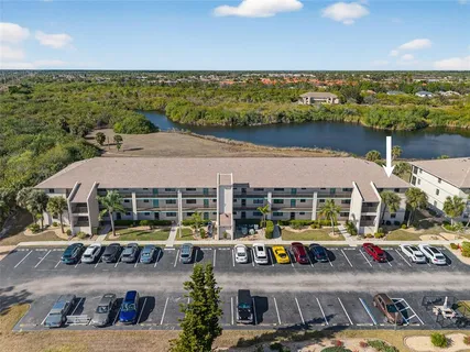 a view of multiple houses with outdoor space