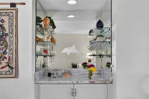 a view of storage and utility room with two shelves