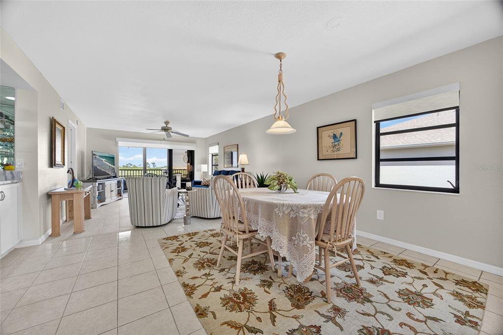 175 Kings Highway, Unit 738 Punta Gorda, FL 33983 - Photo 13 of 36 a view of a dining room with furniture
