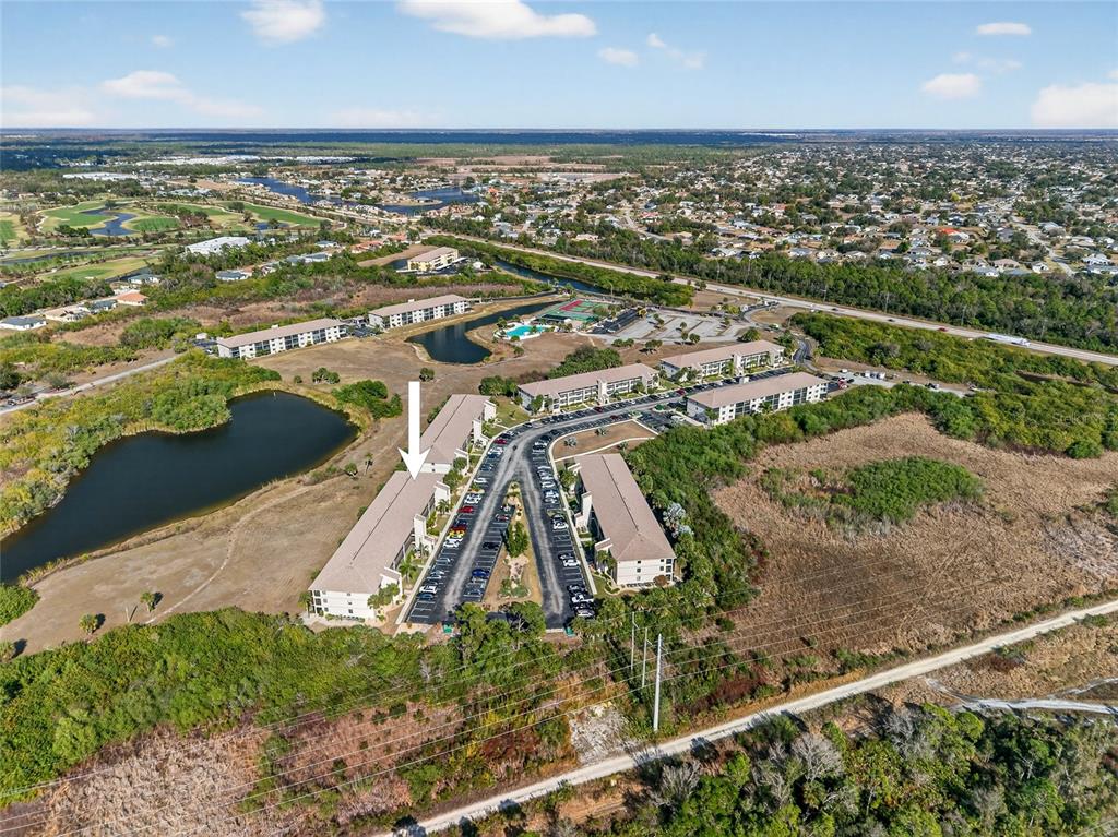 175 Kings Highway, Unit 738 Punta Gorda, FL 33983 - Photo 26 of 36 an aerial view of residential houses with outdoor space