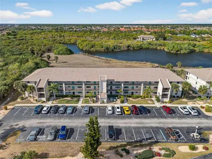 a view of swimming pool with outdoor seating and yard
