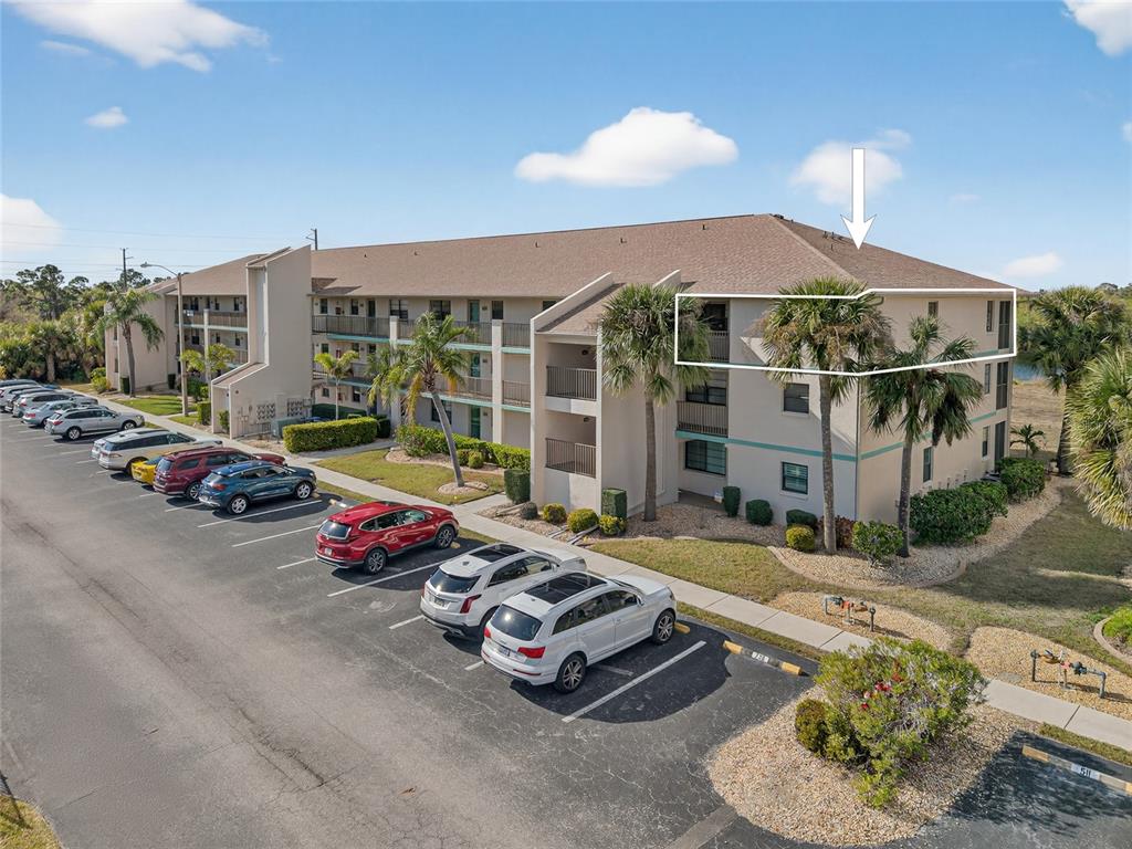 175 Kings Highway, Unit 738 Punta Gorda, FL 33983 - Photo 28 of 36 a view of a patio with table and chairs potted plants