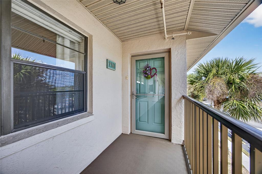 175 Kings Highway, Unit 738 Punta Gorda, FL 33983 - Photo 29 of 36 a view of a balcony with a potted plant