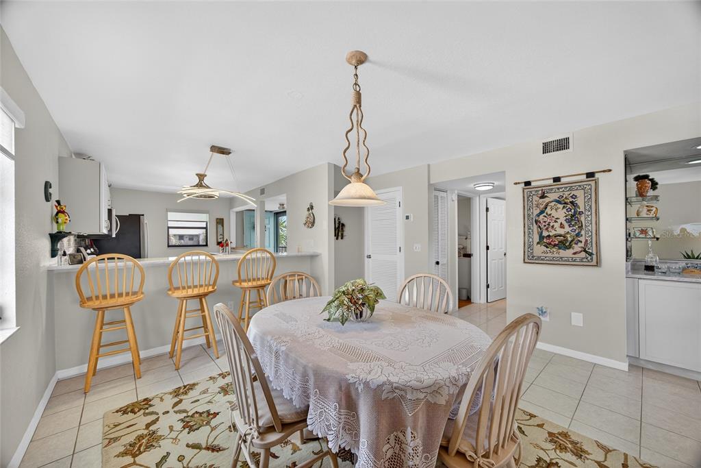 175 Kings Highway, Unit 738 Punta Gorda, FL 33983 - Photo 9 of 36 a view of a dining room with furniture