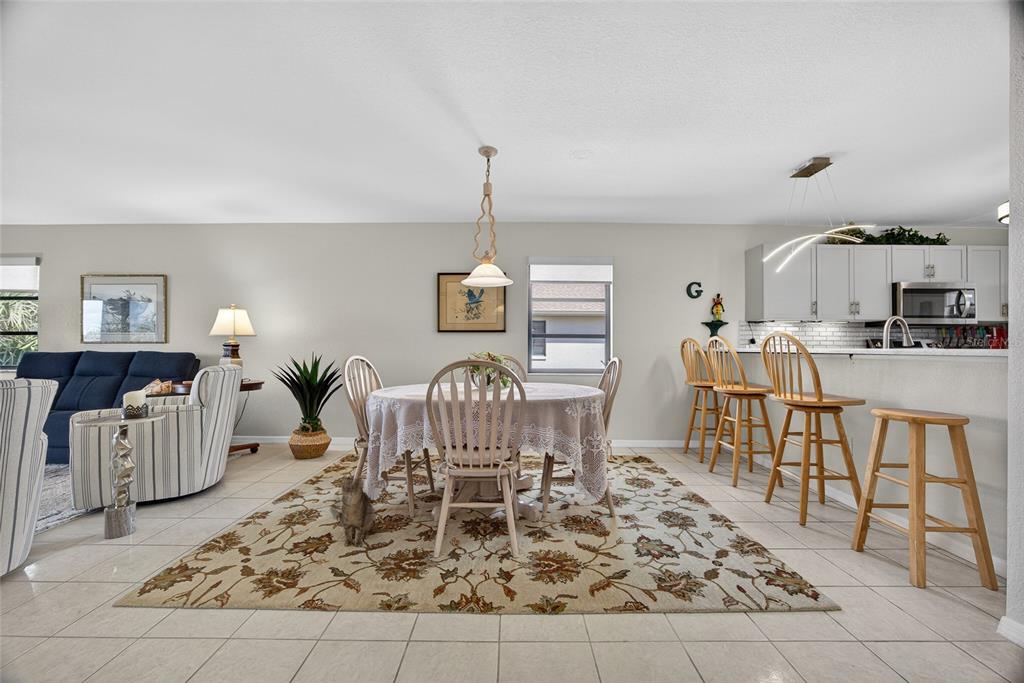 175 Kings Highway, Unit 738 Punta Gorda, FL 33983 - Photo 10 of 36 a view of a dining room with furniture
