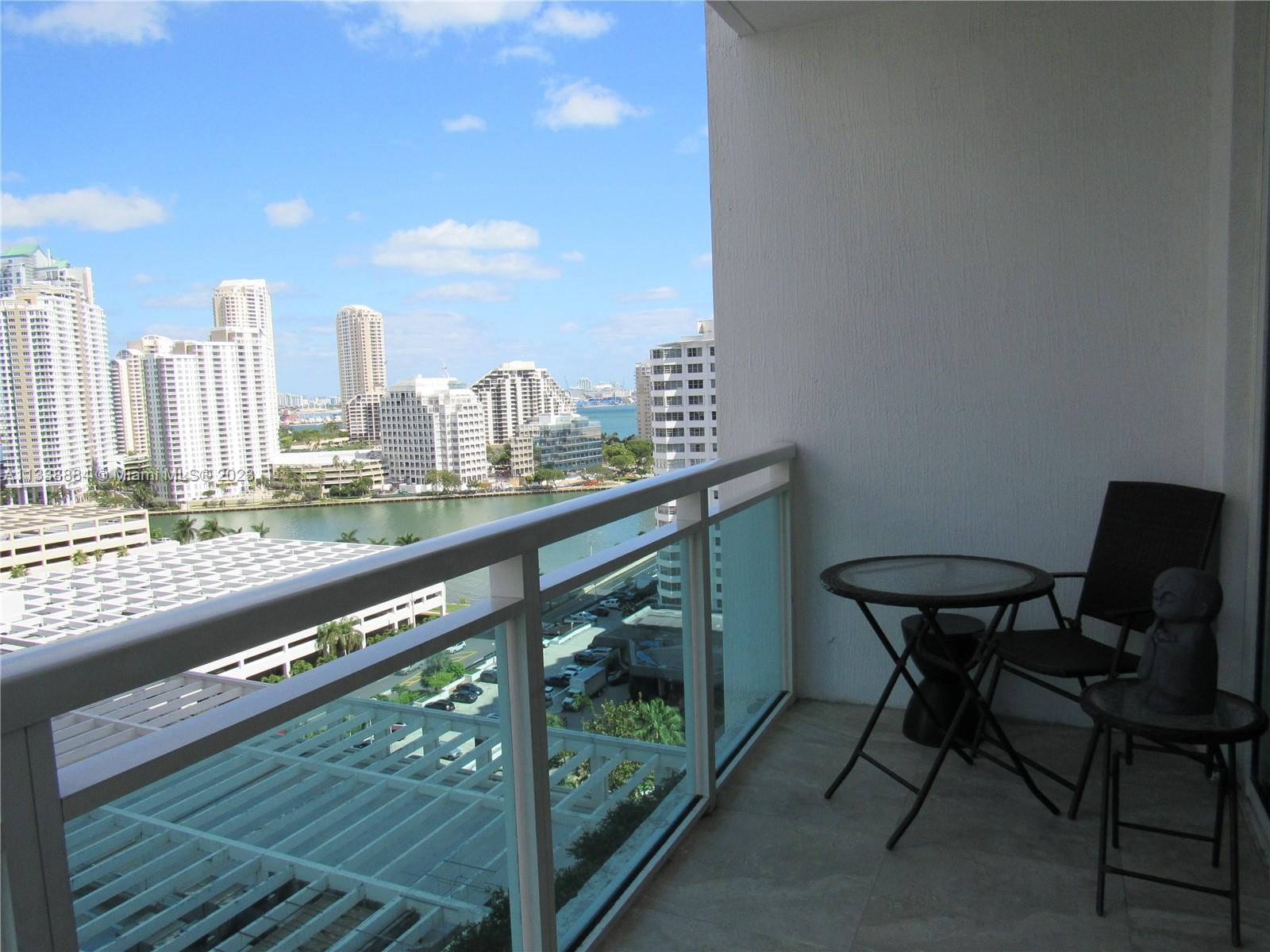 a view of a balcony with city view