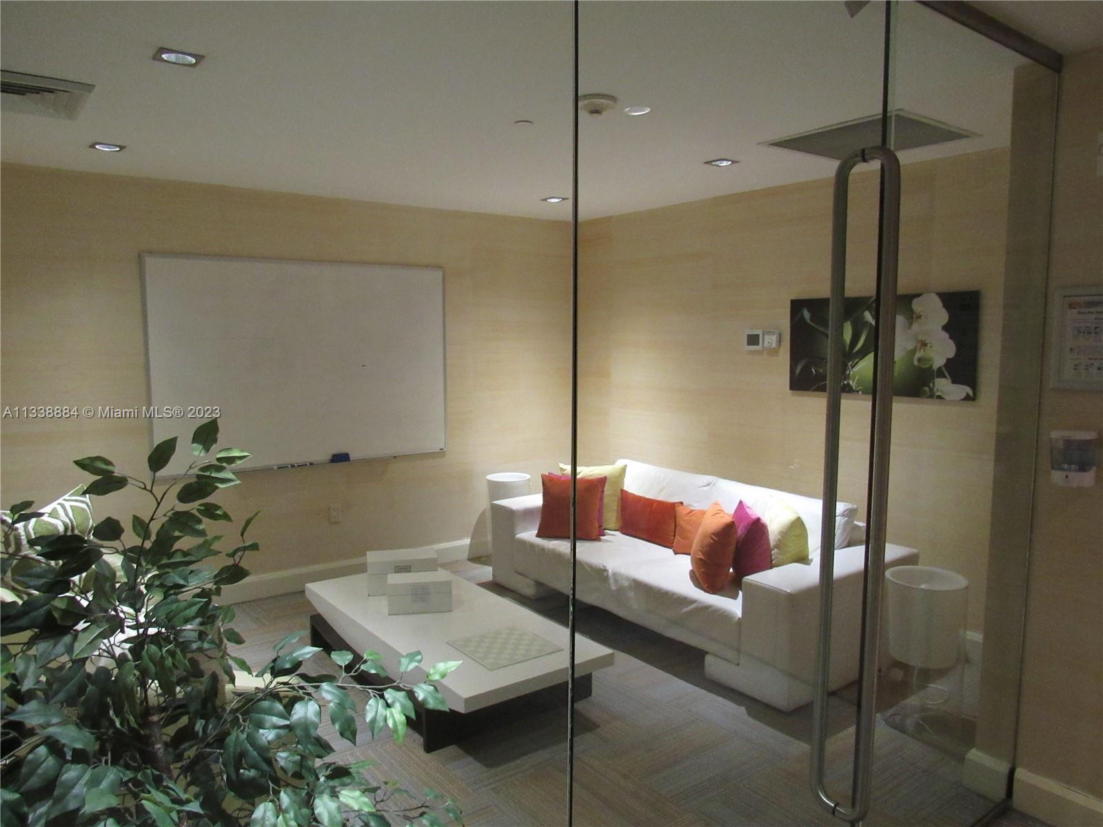 Plaza on Brickell Miami, FL 33131 - Photo 18 of 31 a living room with furniture