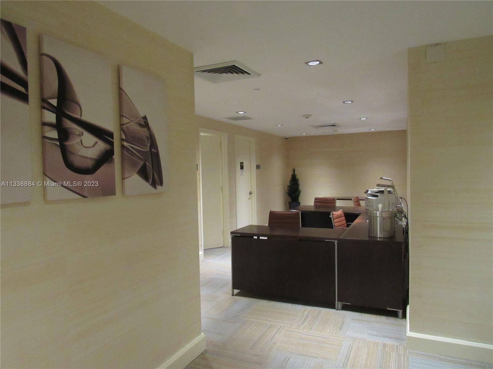 Plaza on Brickell Miami, FL 33131 - Photo 20 of 31 a bedroom with a bed and cabinets