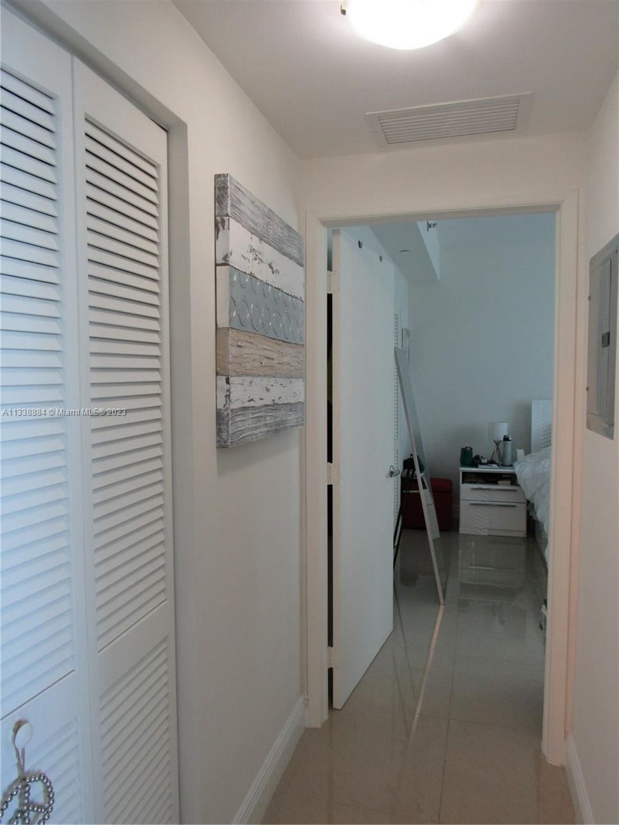 Plaza on Brickell Miami, FL 33131 - Photo 9 of 31 a view of a room with shelves