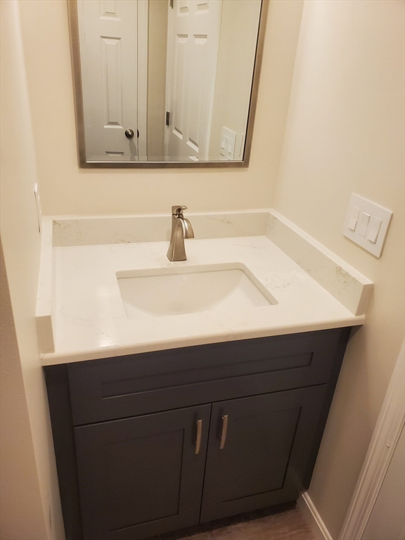 4 Highland Avenue Harvard, MA 01451 - Photo 21 of 29 a bathroom with a sink and a mirror
