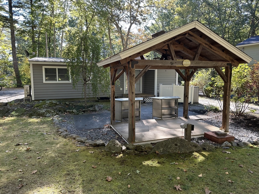 4 Highland Avenue Harvard, MA 01451 - Photo 5 of 29 a front view of a house with garden