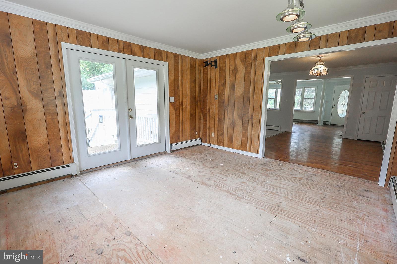48146 Mallard View Lane St. Inigoes, MD 20684 - Photo 18 of 46 Spacious room with warm wood accents.