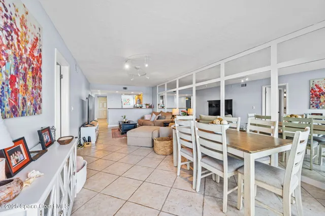 a view of kitchen with furniture and wooden floor