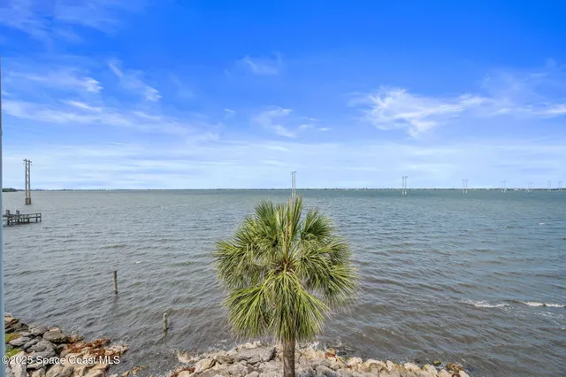 a bedroom with a bed and closet