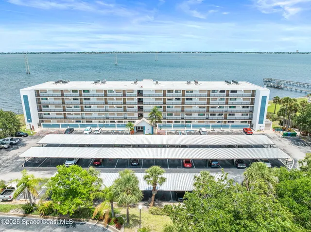 a view of a city with an ocean view