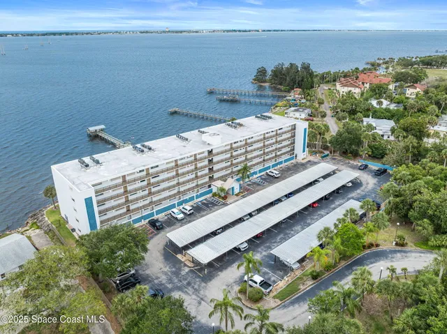 a street sign that is sitting on a wall