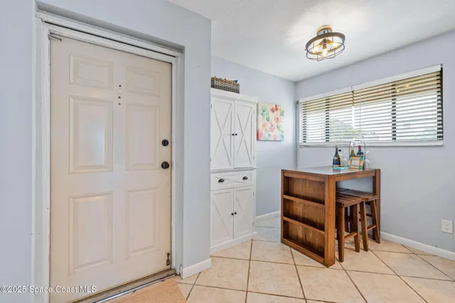 a kitchen with stainless steel appliances a stove sink and microwave