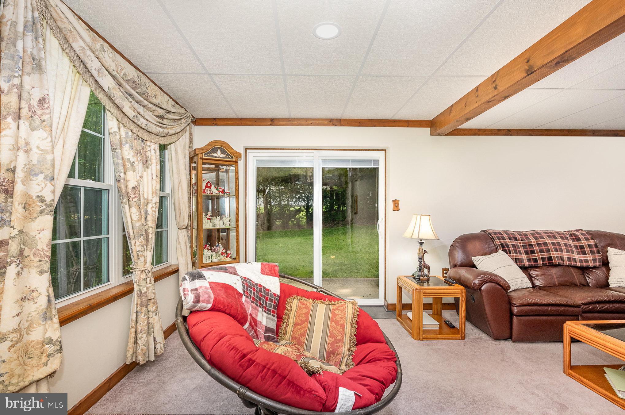 25761 Ricky Drive Hollywood, MD 20636 - Photo 22 of 41 Family rm access to yard thru newer sliding doors
