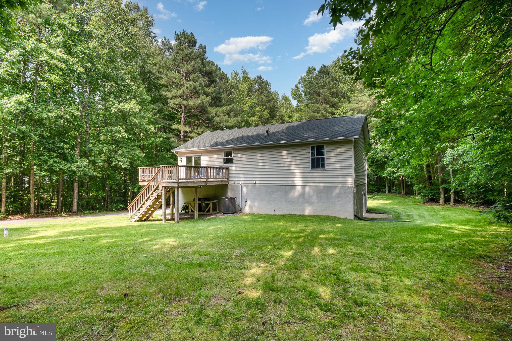 25761 Ricky Drive Hollywood, MD 20636 - Photo 31 of 41 Rear exterior with deck