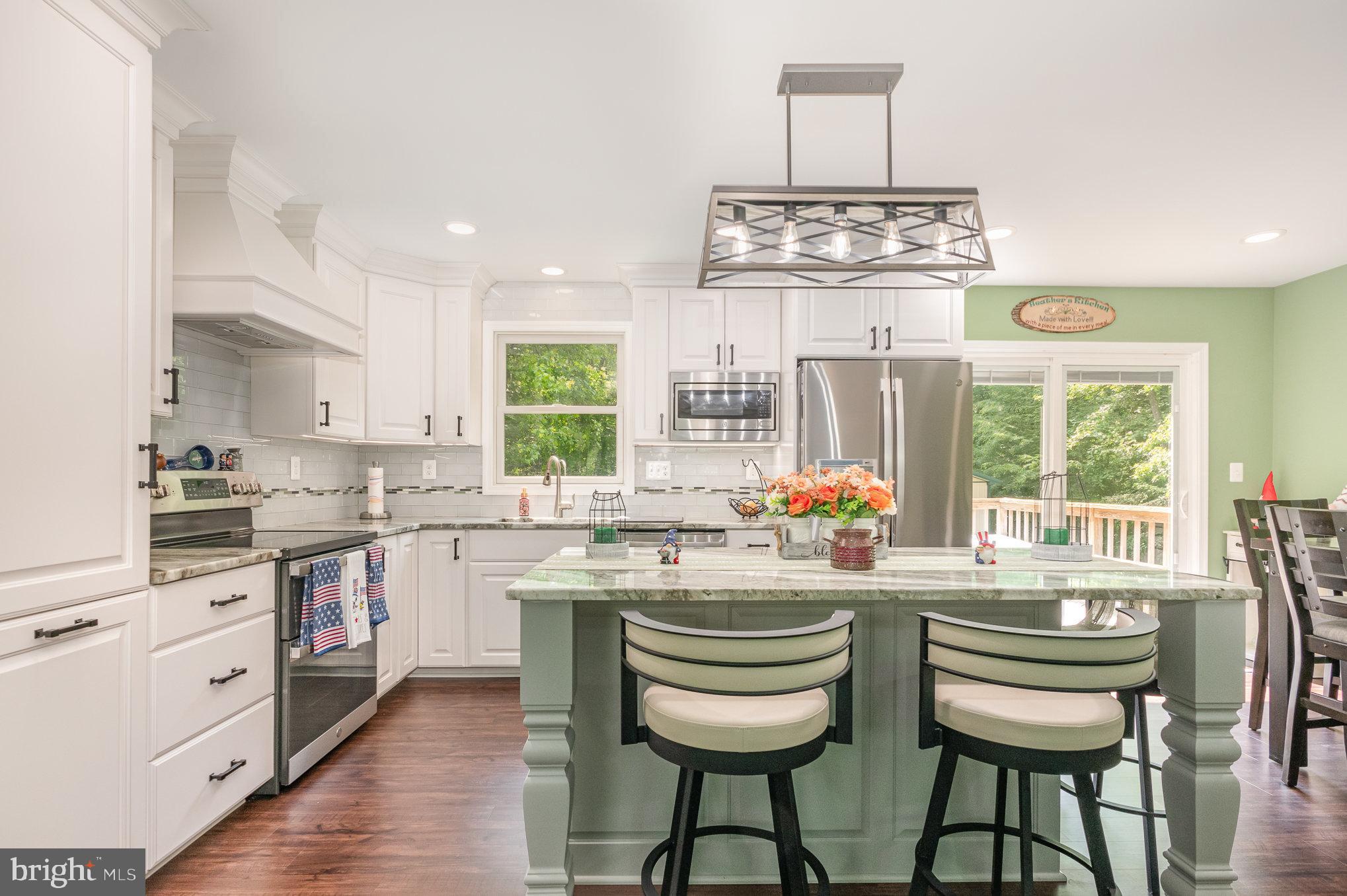 25761 Ricky Drive Hollywood, MD 20636 - Photo 7 of 41 Gather around the gorgeous island!