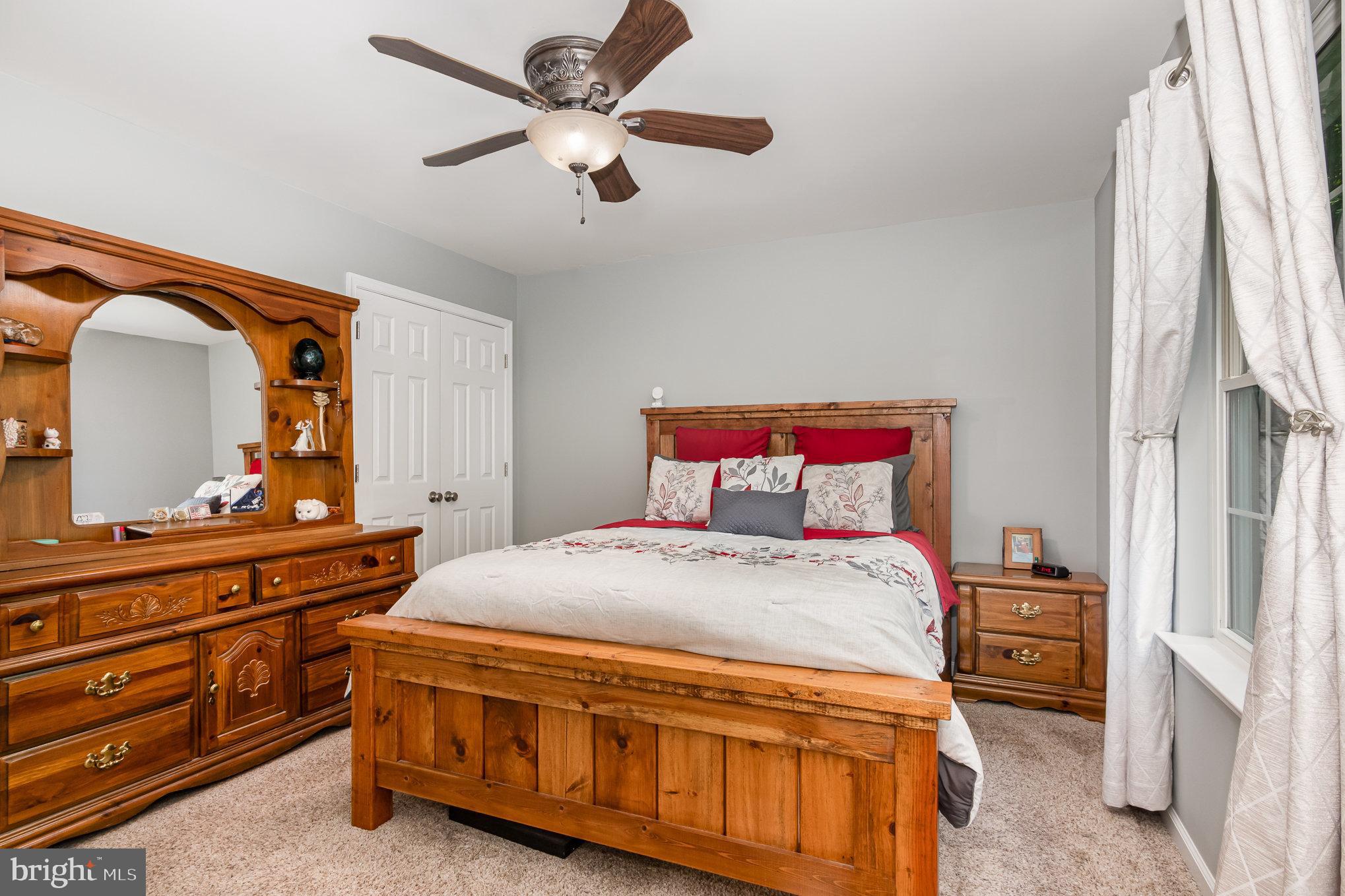 25761 Ricky Drive Hollywood, MD 20636 - Photo 8 of 41 Primary bedroom with his & hers closets