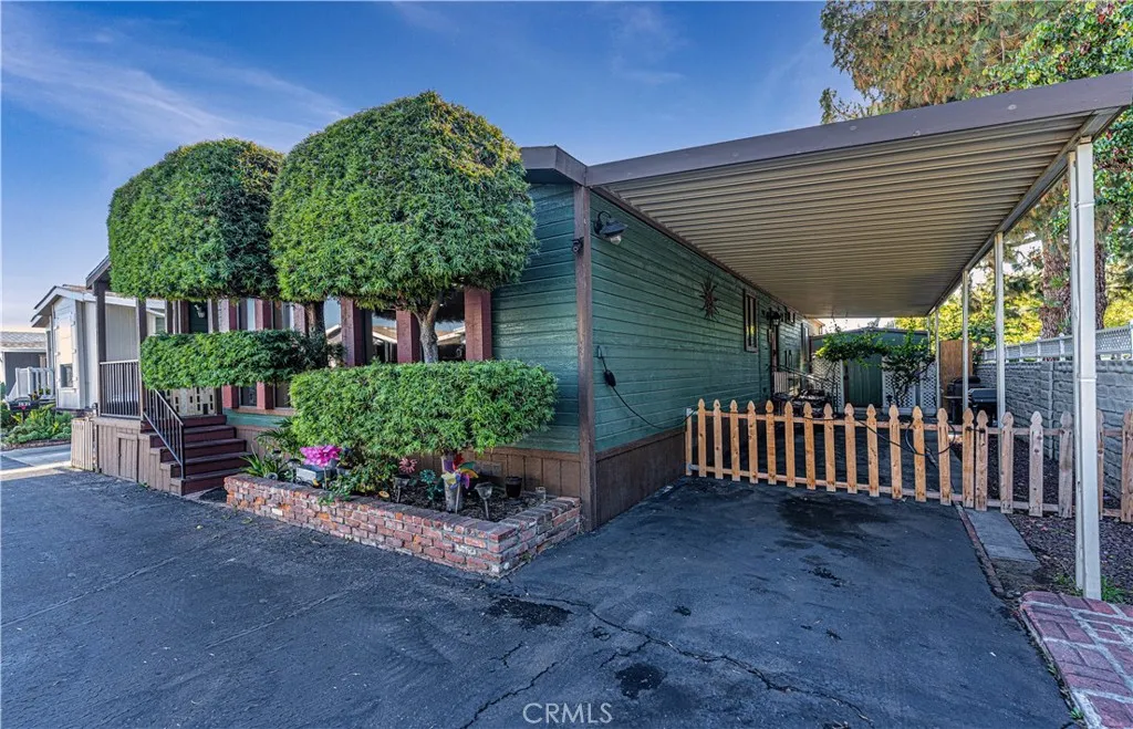 9080 Bloomfield Avenue, Unit 191 Cypress, CA 90630 - Photo 15 of 22 a front view of a house having yard