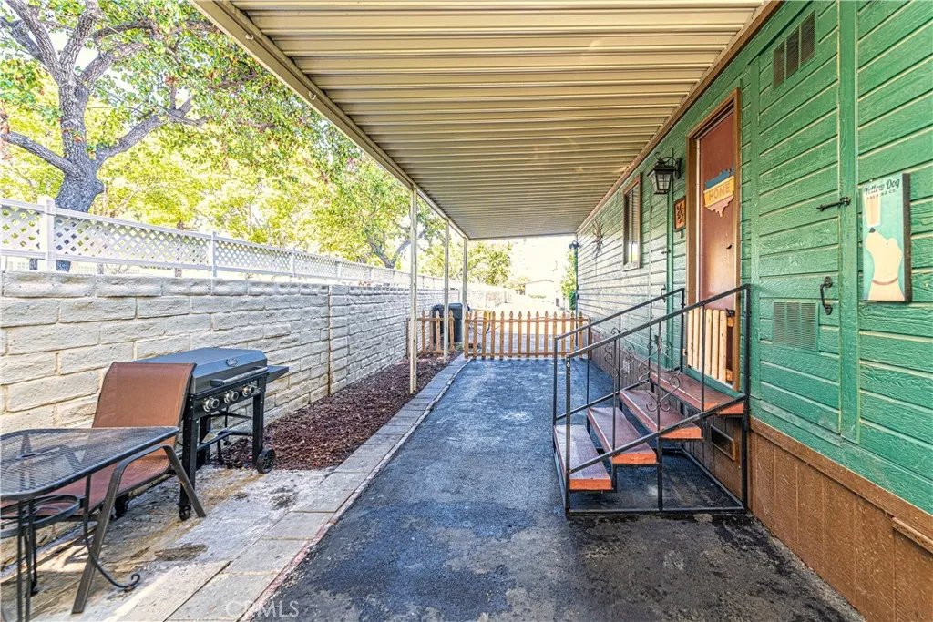 9080 Bloomfield Avenue, Unit 191 Cypress, CA 90630 - Photo 16 of 22 a view of a chairs and table in the balcony