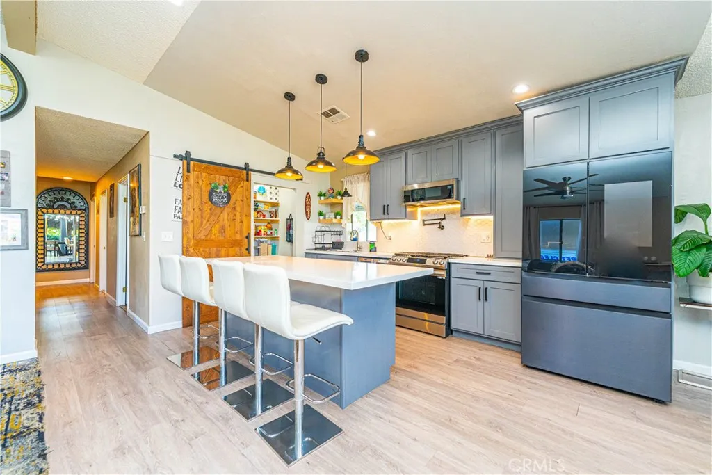 9080 Bloomfield Avenue, Unit 191 Cypress, CA 90630 - Photo 4 of 22 a large kitchen with a table and chairs
