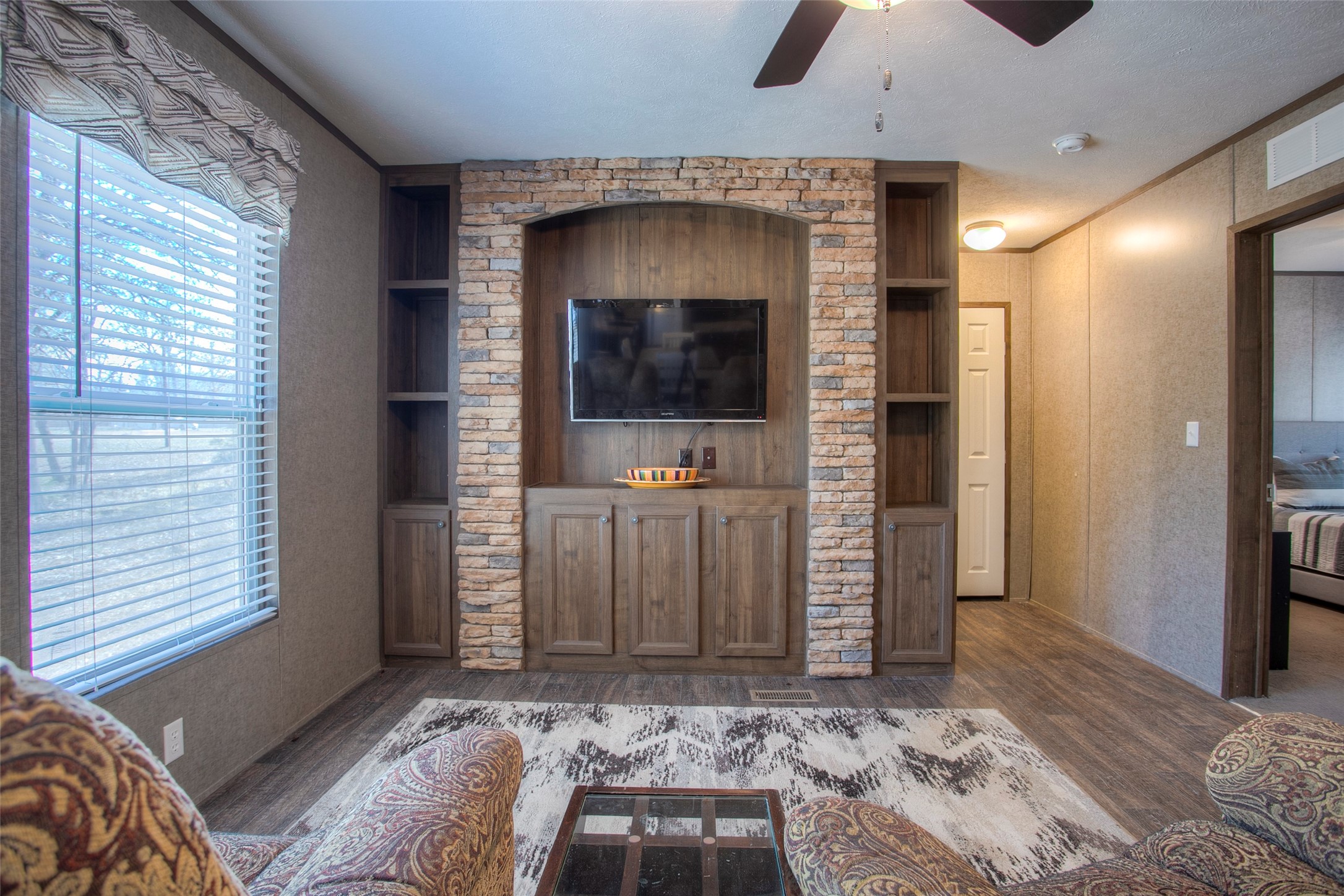277 Rio Grande Drive Trinity, TX 75862 - Photo 12 of 50 a living room with furniture and a flat screen tv