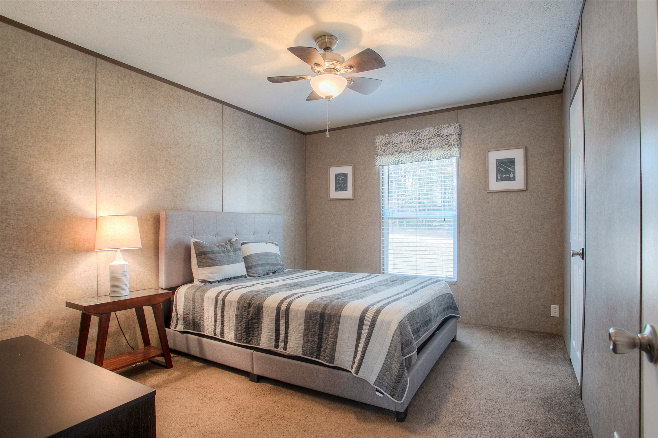277 Rio Grande Drive Trinity, TX 75862 - Photo 20 of 50 a bedroom with a bed and a ceiling fan