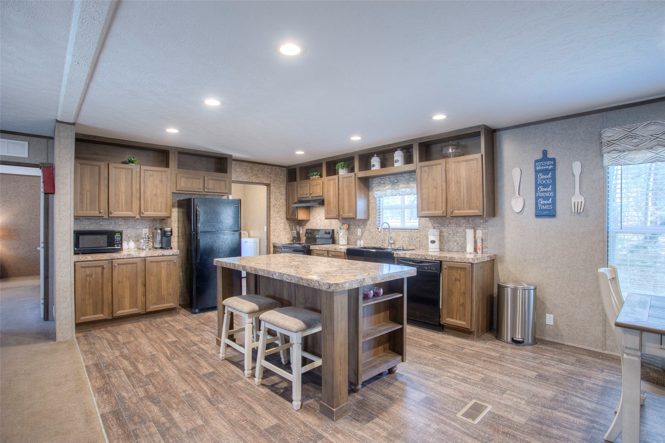 277 Rio Grande Drive Trinity, TX 75862 - Photo 2 of 50 while the oversized island offers plenty of seating for casual meals and entertaining.