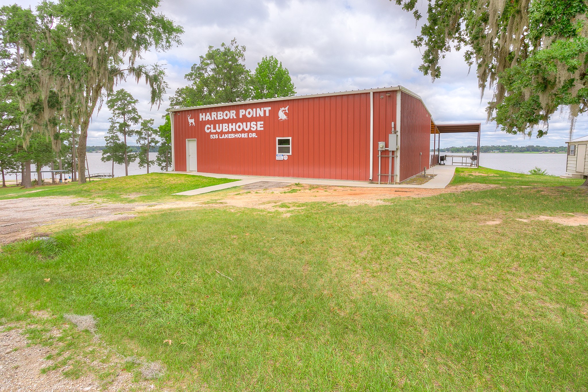 277 Rio Grande Drive Trinity, TX 75862 - Photo 38 of 50 a view of a street with a yard and large trees