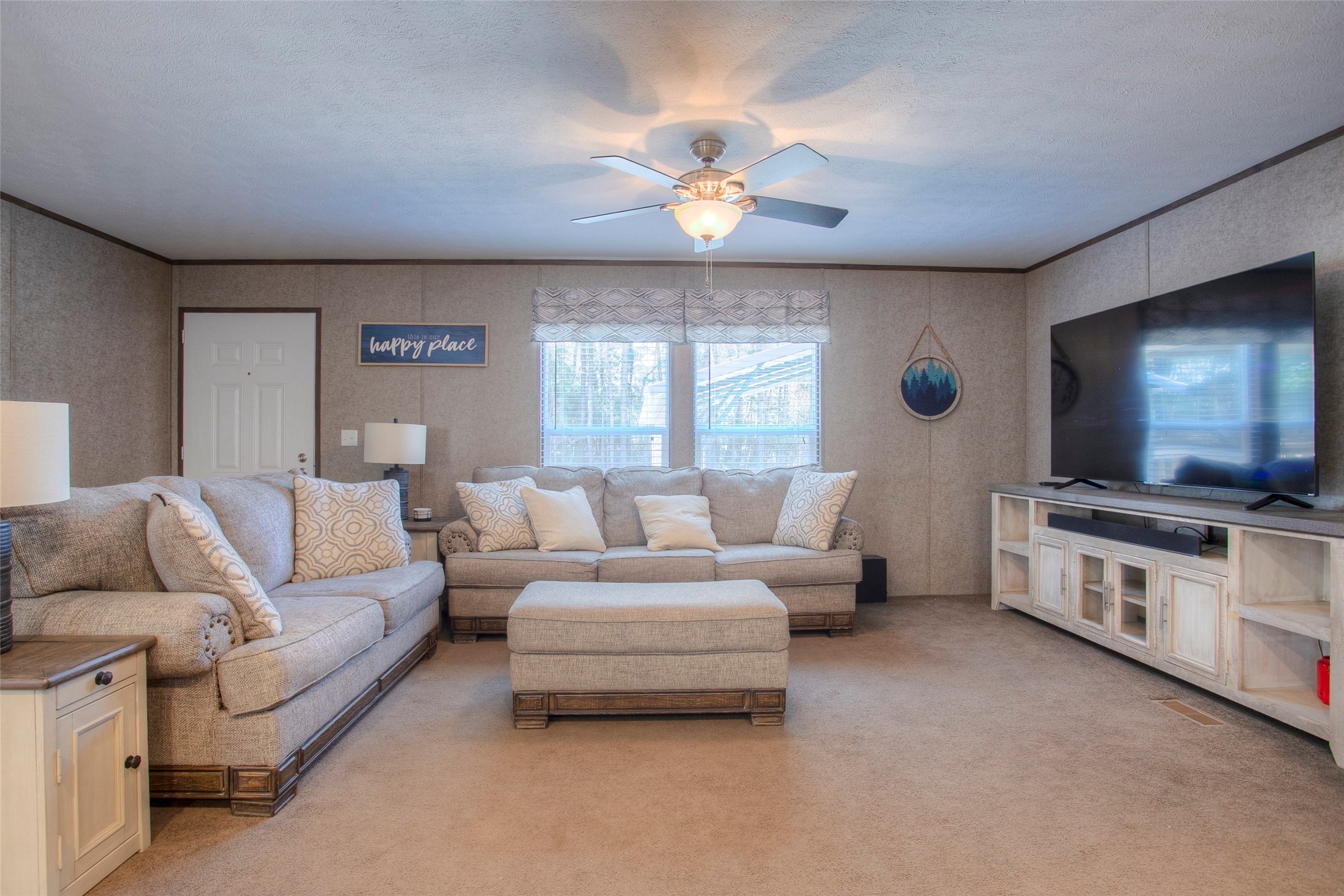 277 Rio Grande Drive Trinity, TX 75862 - Photo 9 of 50 a living room with furniture and a flat screen tv