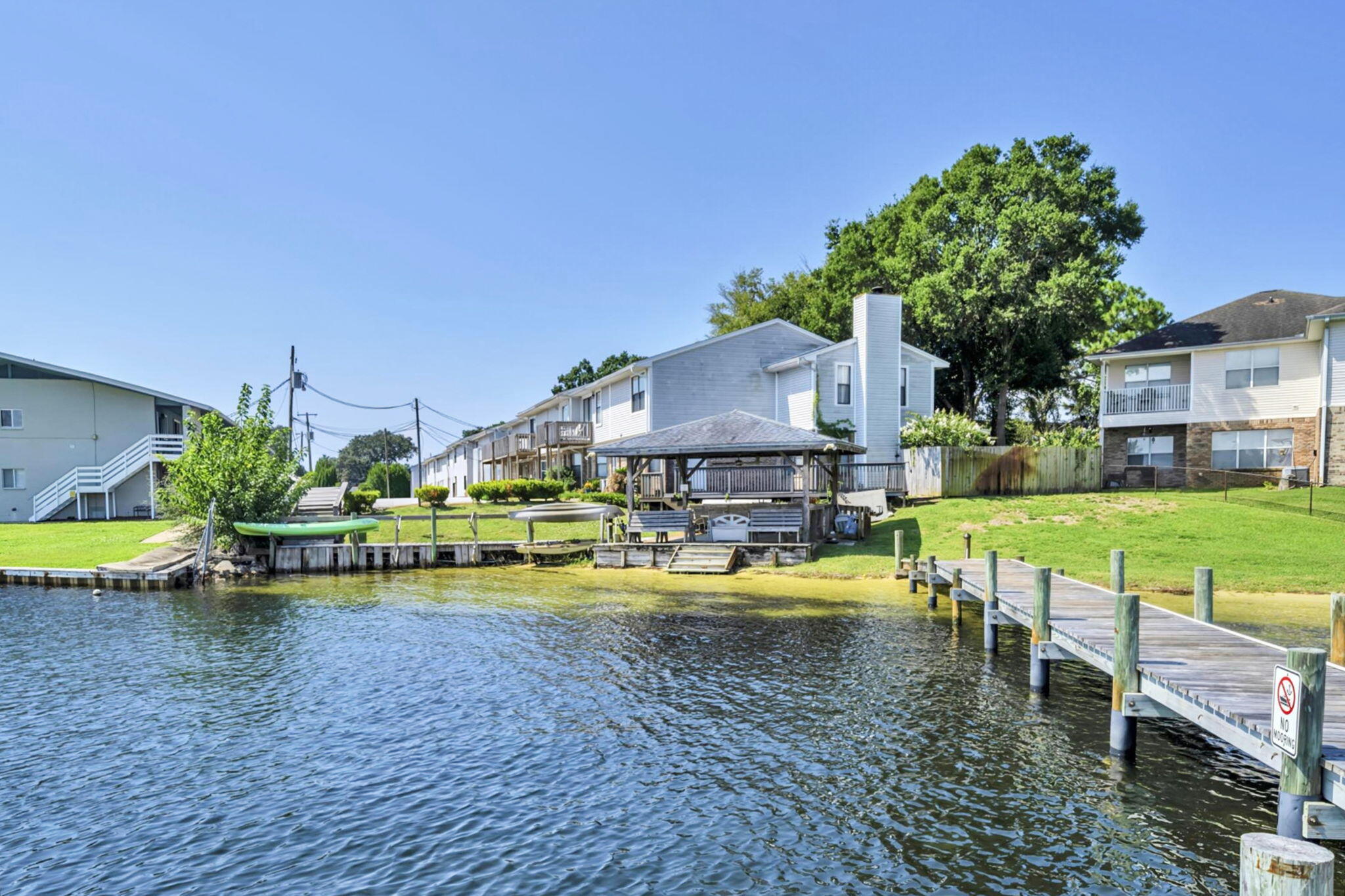 421 Waterway Lane Fort Walton Beach, FL 32547 - Photo 26 of 32 a view of a swimming pool with a patio