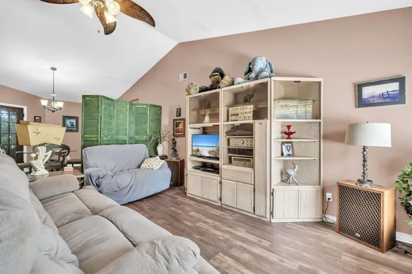 a living room with furniture and a window